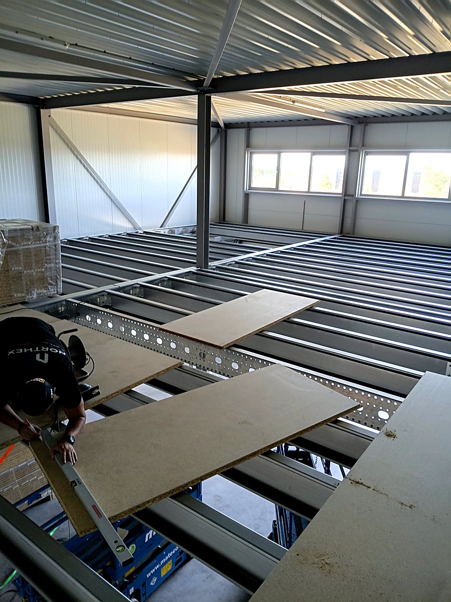 Northex installer laying mezzanine floor decking — DWB investments B.V., Purmerend